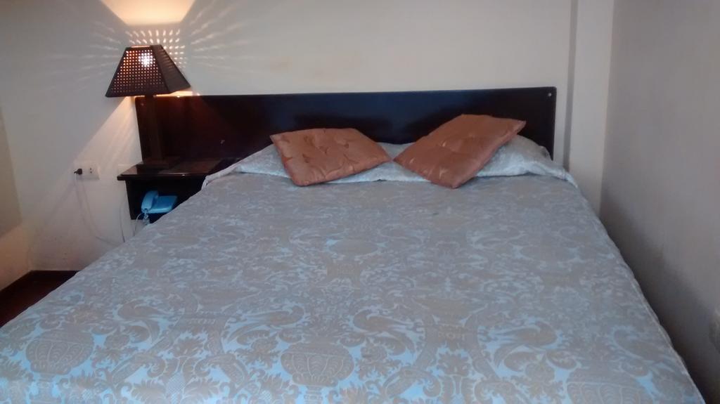 Hostal Iquique Lima Quarto foto